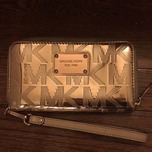 Rose gold Michael Kors clutch